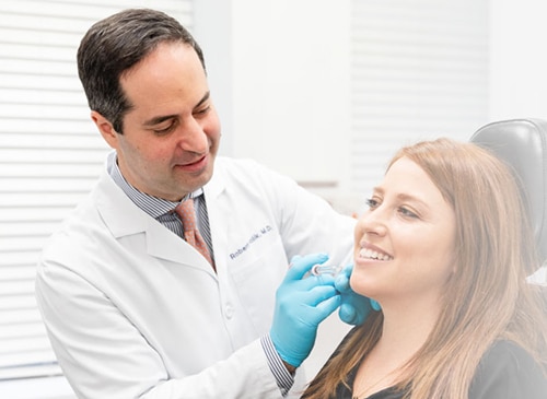 doctor administering injectables in NYC