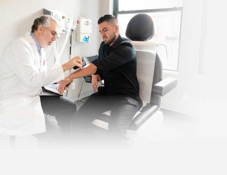 Dr_Siedenberg_Medical-Dermatology_Male-Patient-In-Chair_New-York_NYC_Mobile_001 laser tattoo removal in new york