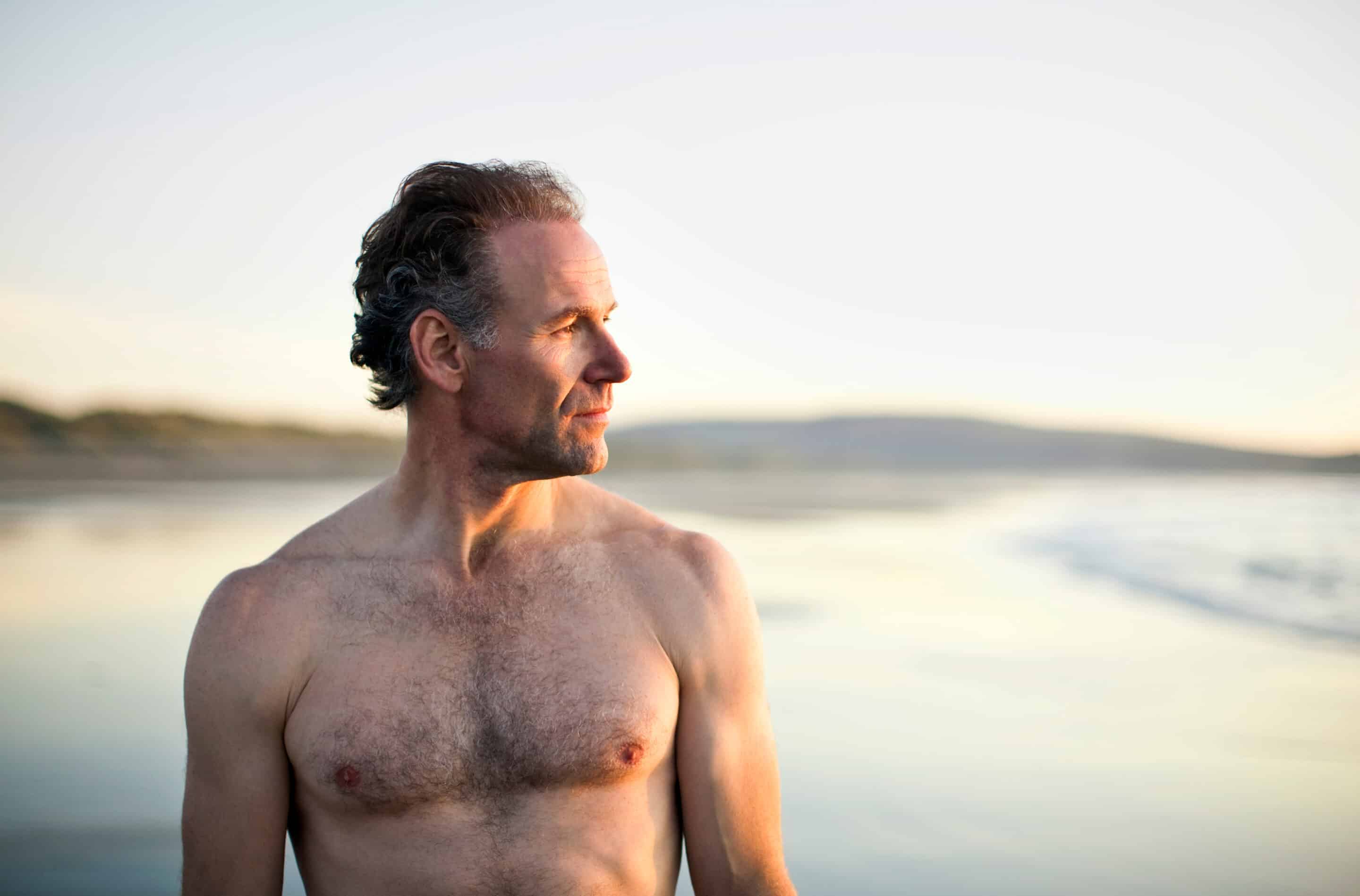 Plastic-surgery-man-on-beach-Laser-Surgery-New-York-NYC-2.png male gynecomastia in nyc