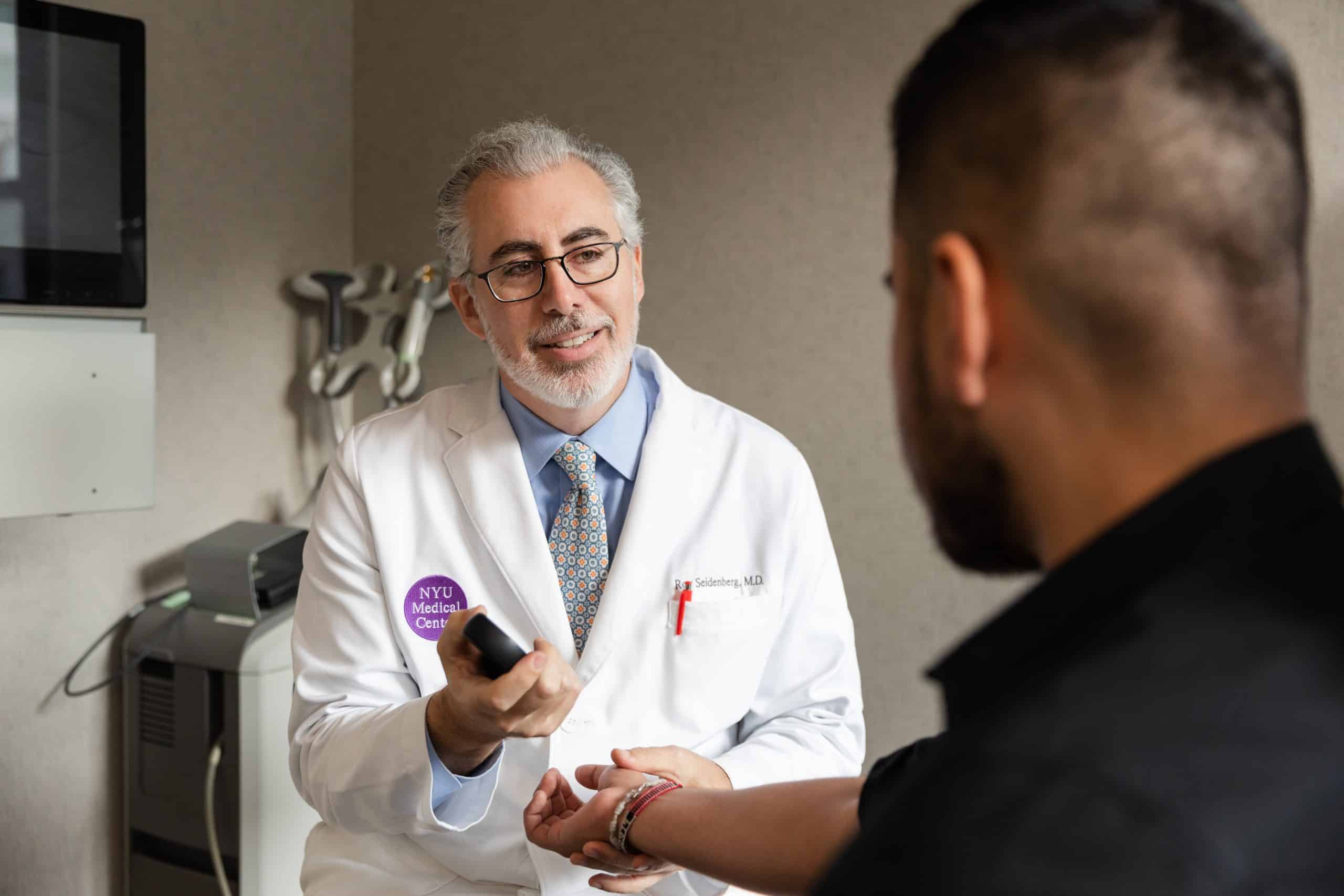 nail treatments-NY-NY patient discussing nail treatments with dermatologist in NY, NY