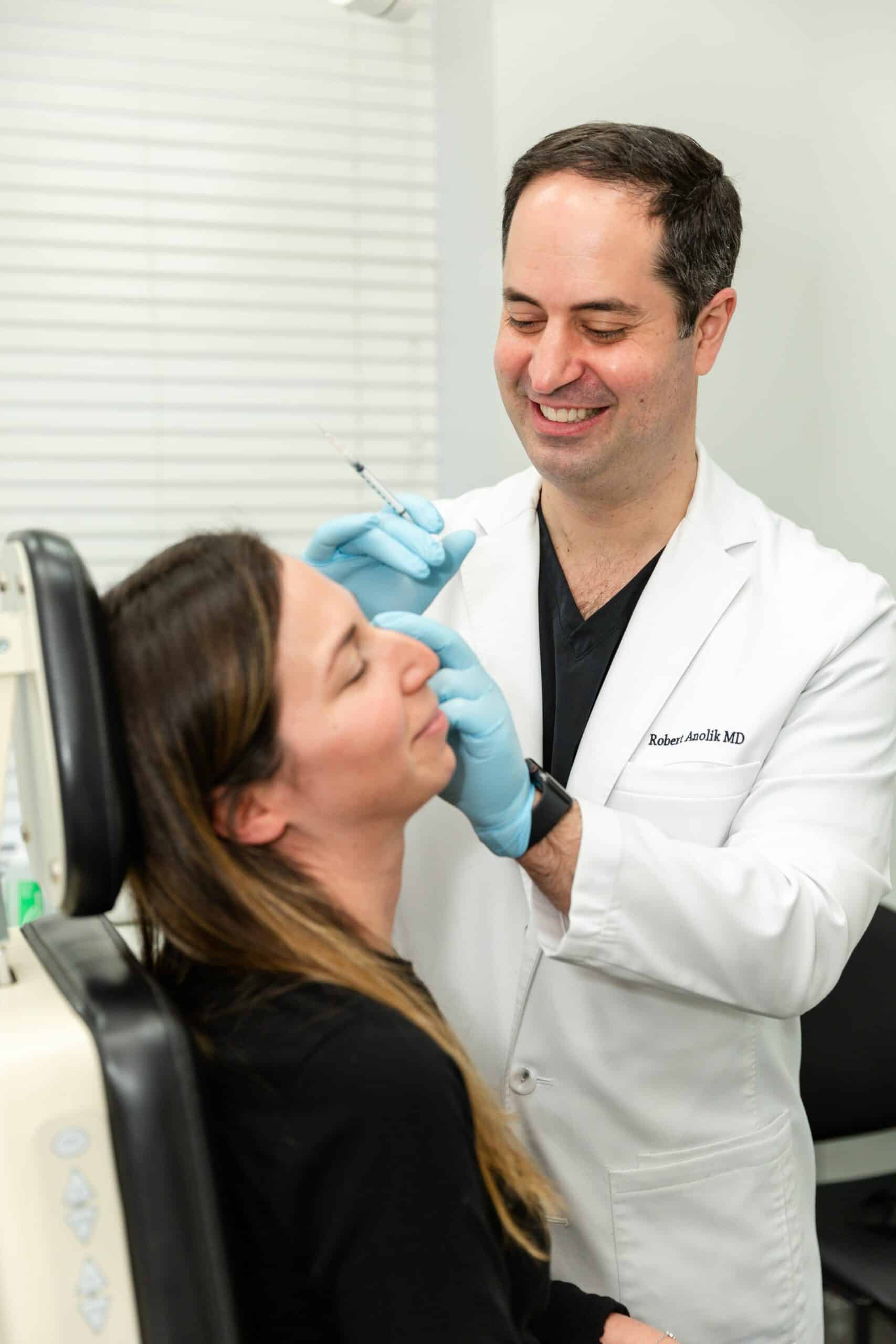 Botox-injections-for-crows-feet-Anolik-LSSC-NYC-1 dermatologist consulting with a patient who is interested in Sofwave skin tightening in NYC, NY