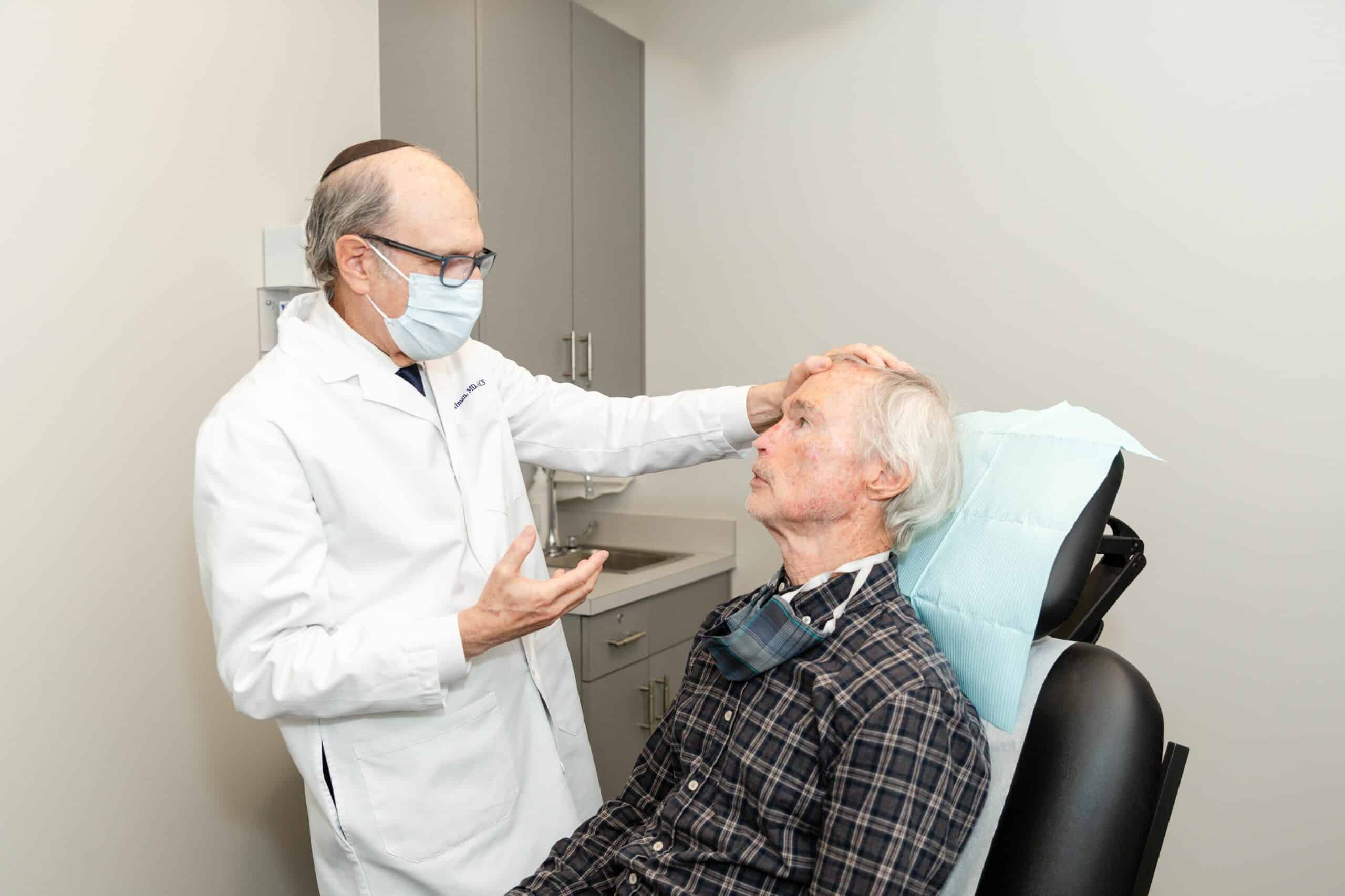 Patient-consultation-plastic-surgery-exam-chair-Hoffman-LSSC-NYC-6 neck lift in new york