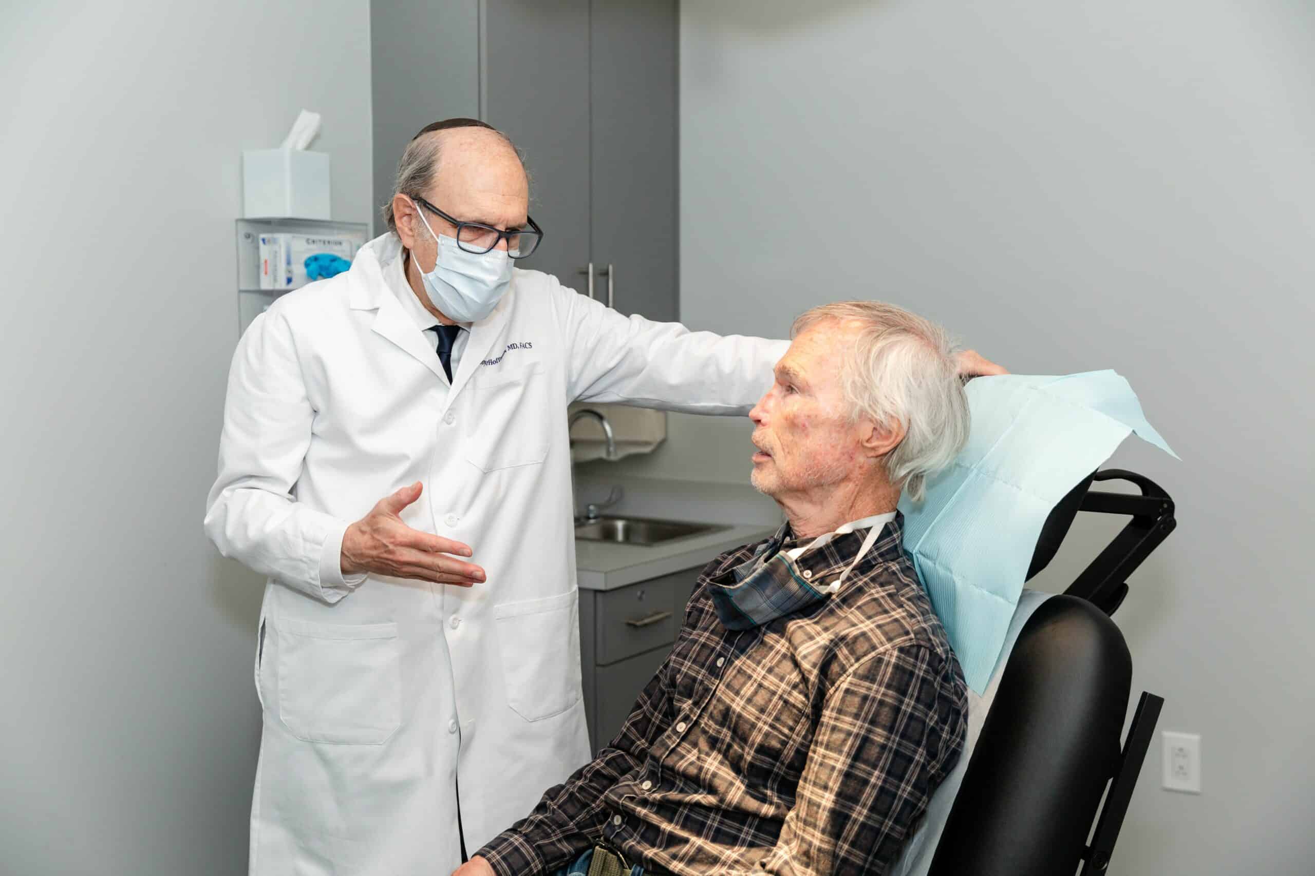 Patient-consultation-plastic-surgery-exam-chair-Hoffman-LSSC-NYC eyelid surgery in nyc