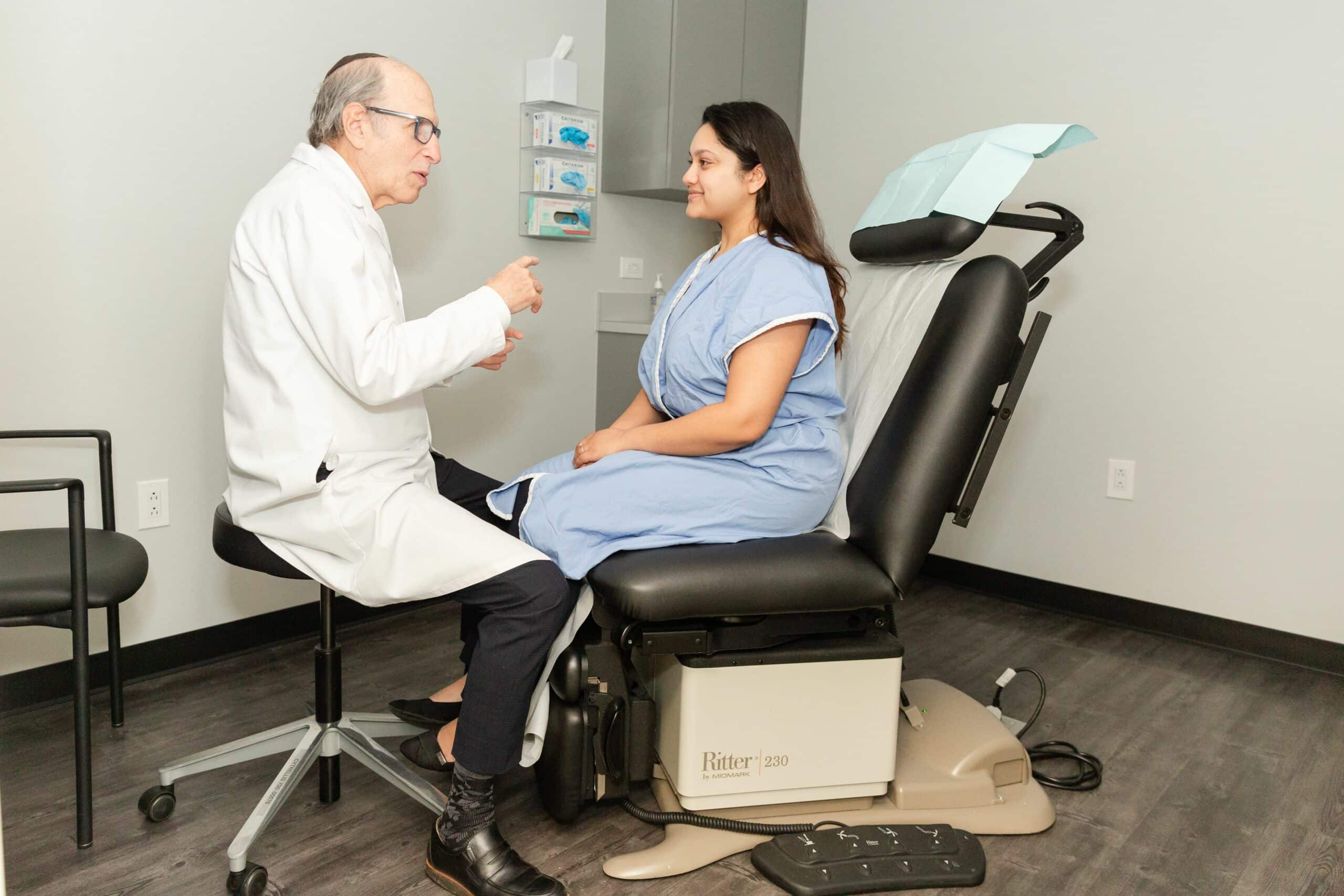 Patient-consultation-plastic-surgery-female-exam-chair-Hoffman-LSSC-NYC-1 breast reconstruction patient