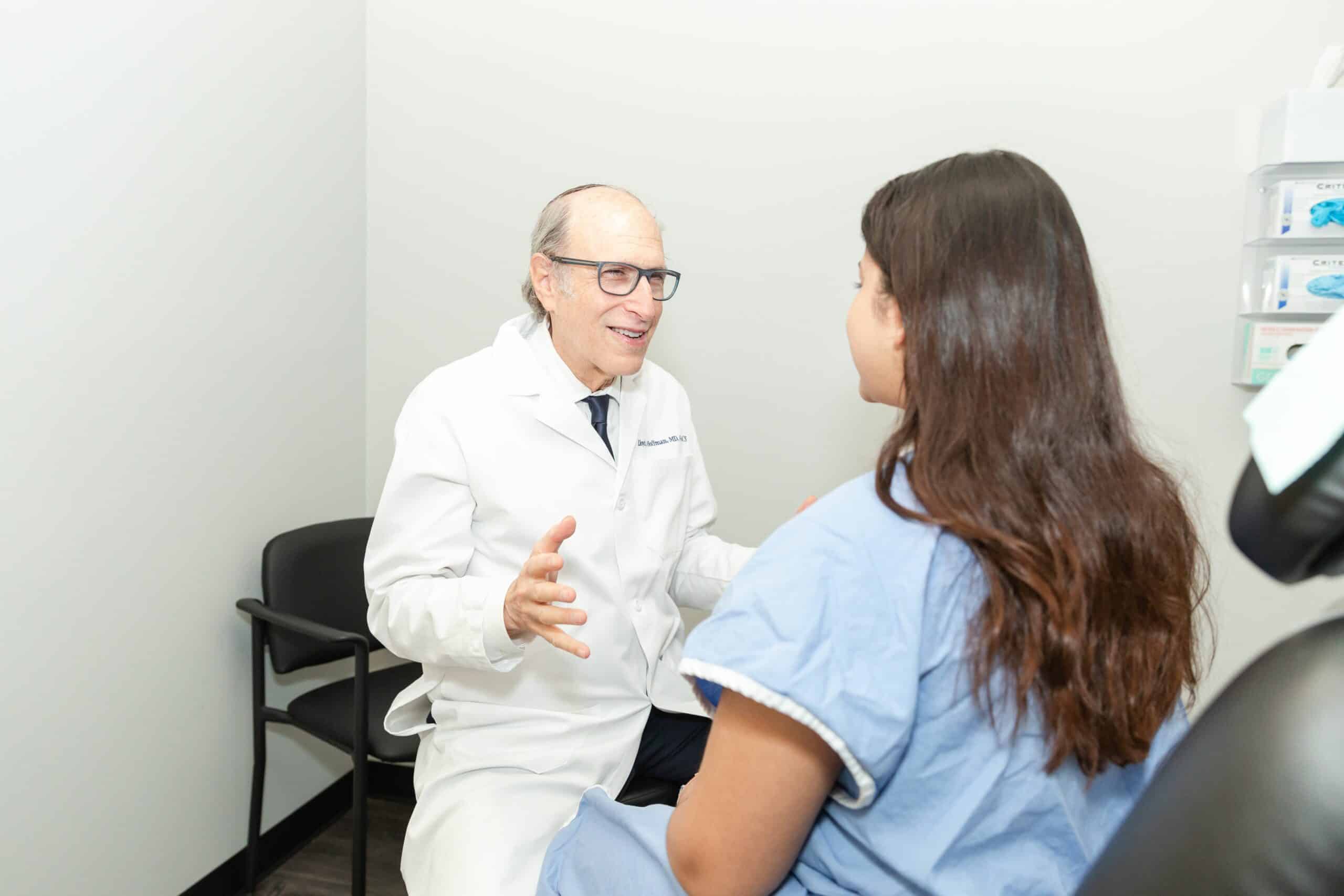 Patient-consultation-plastic-surgery-female-exam-chair-Hoffman-LSSC-NYC-3 liposuction consultation in nyc
