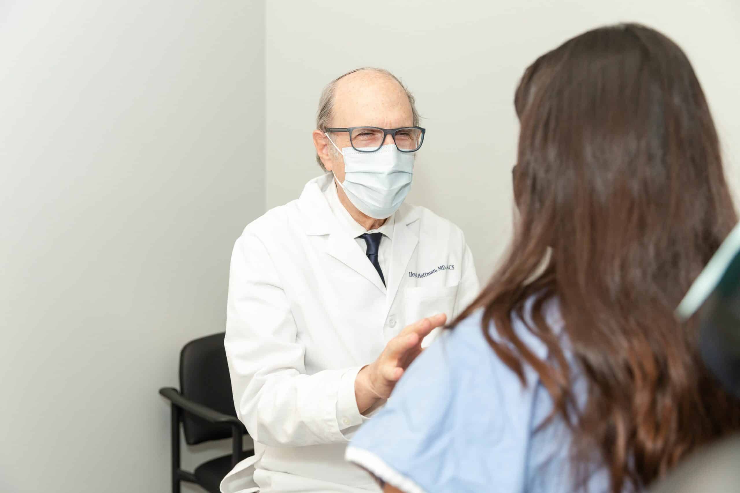 Patient-consultation-plastic-surgery-female-exam-chair-Hoffman-LSSC-NYC-4 Laser and Skin Surgery Center of New York Image of a leg with Leg veins and after the treatment, New York, NY