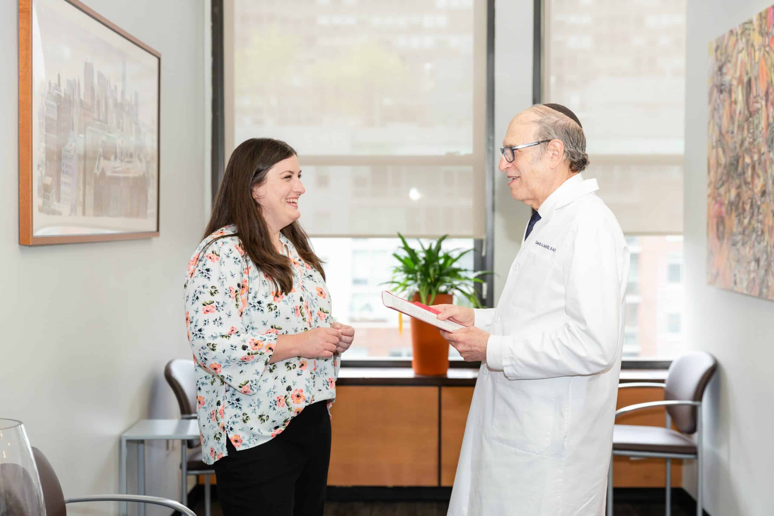 Patient-consultation-plastic-surgery-standing-Hoffman-LSSC-NYC breast reconstruction in new york city