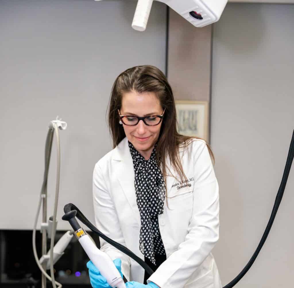 Dr. Jessica Krant, board certified dermatologist-manhattan-NY Board certified dermatologist Dr. Jessica Krant is applying a treatment on her patient at Laser & Skin Surgery Center in NYC, NY.