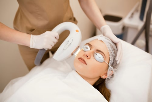 Model image of a young woman getting bbl laser treatment, NYC, NY.