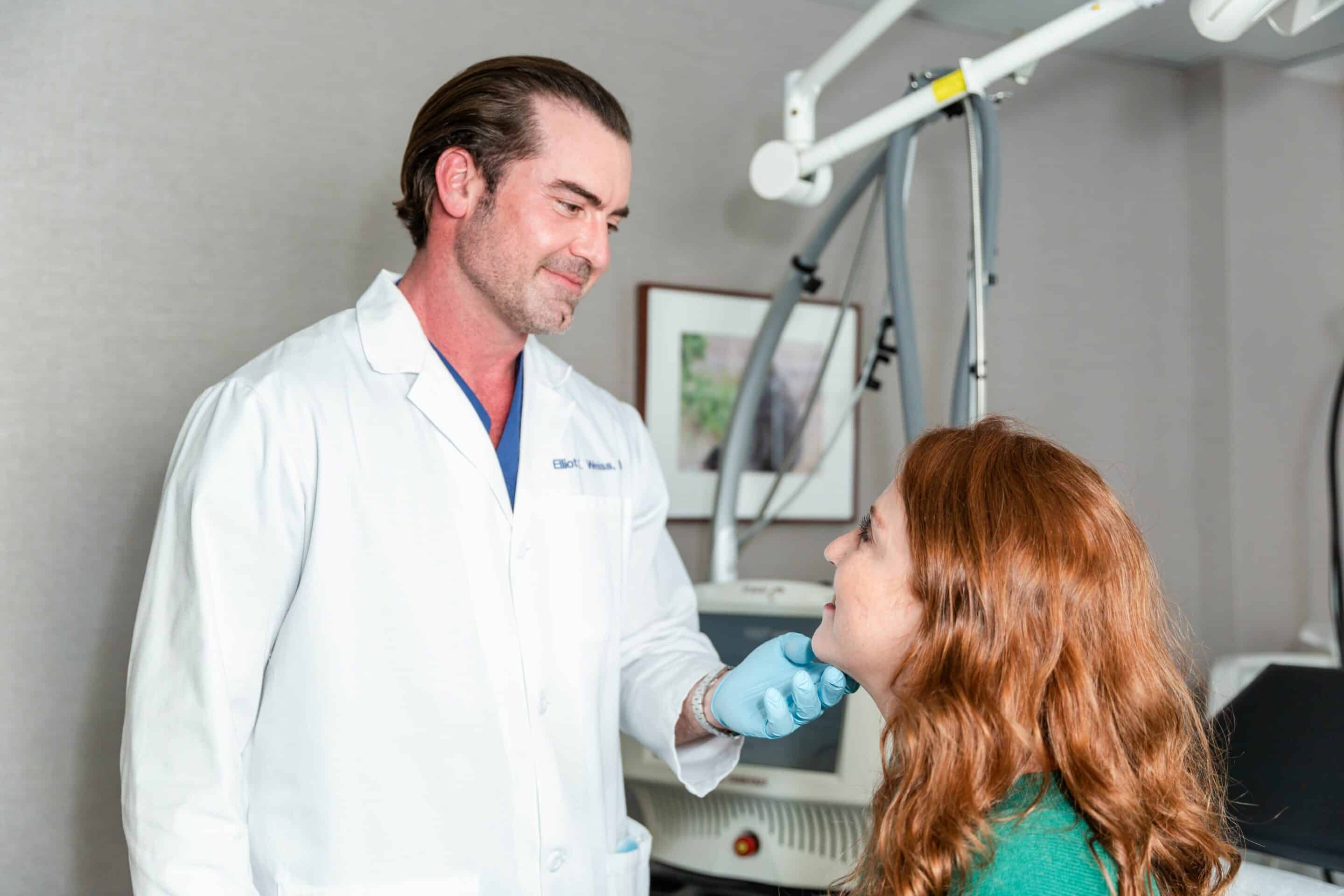 doctor performing laser scar treatment in New York City