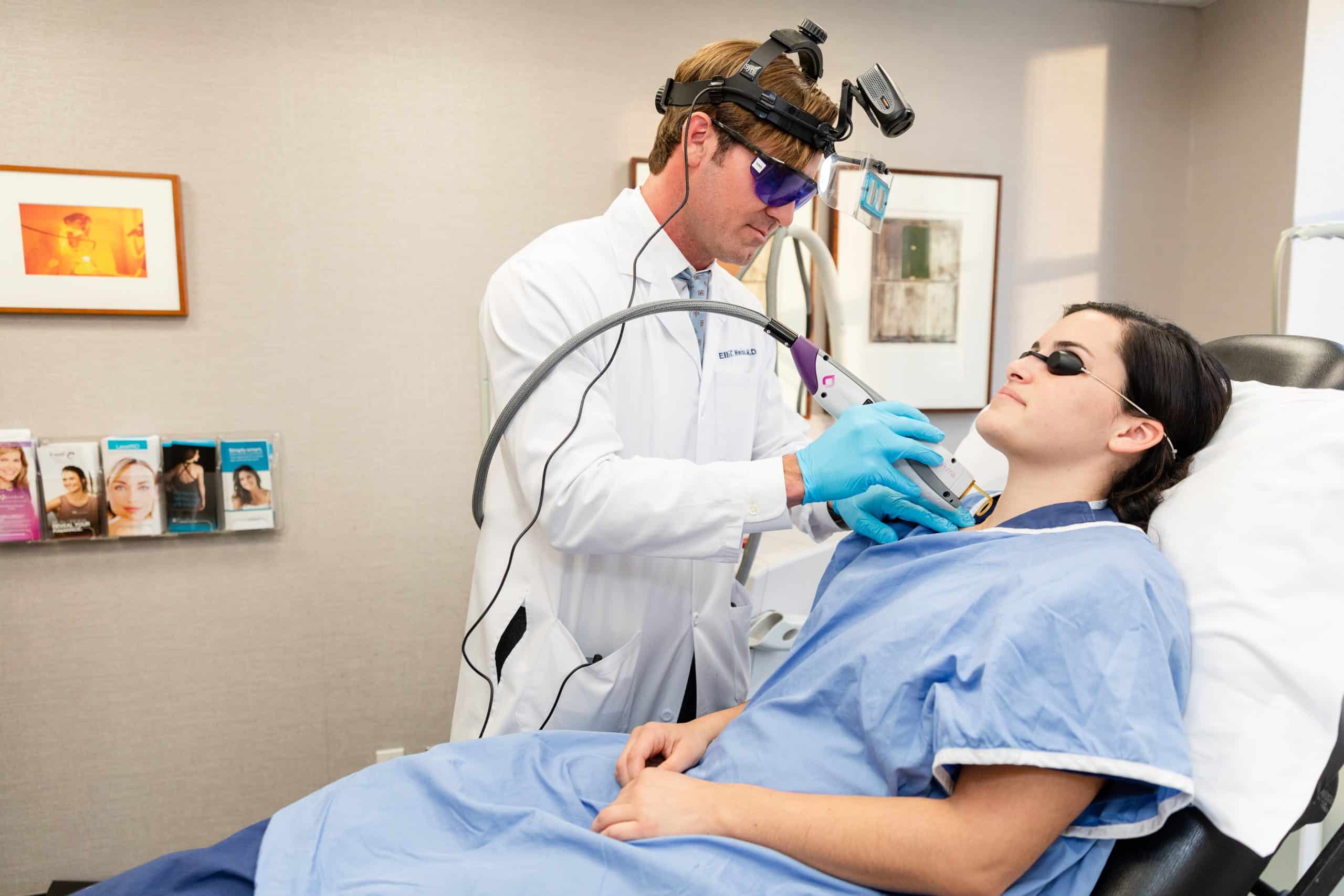 doctor performing laser scar treatment in New York City