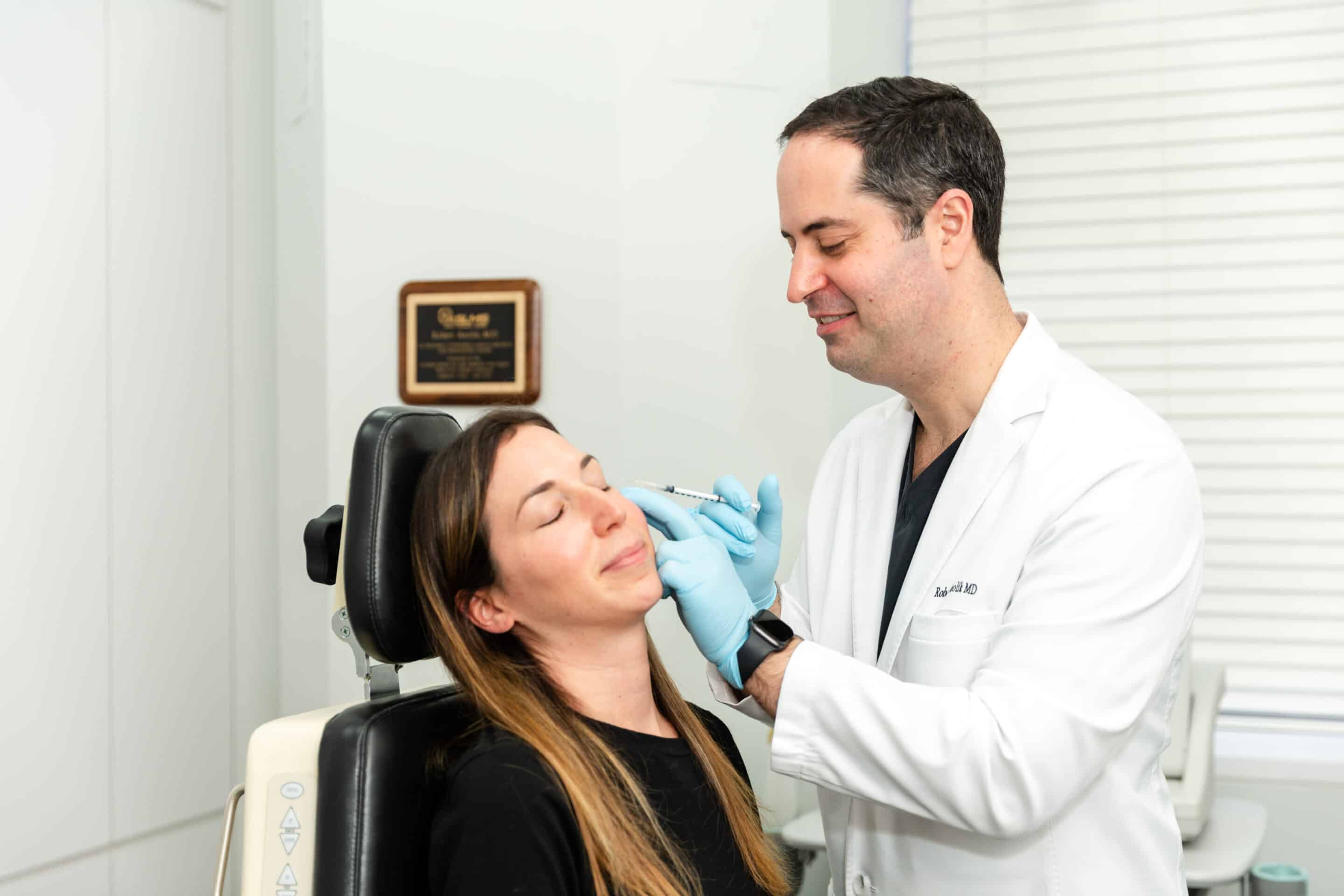 dermatologist with his patient