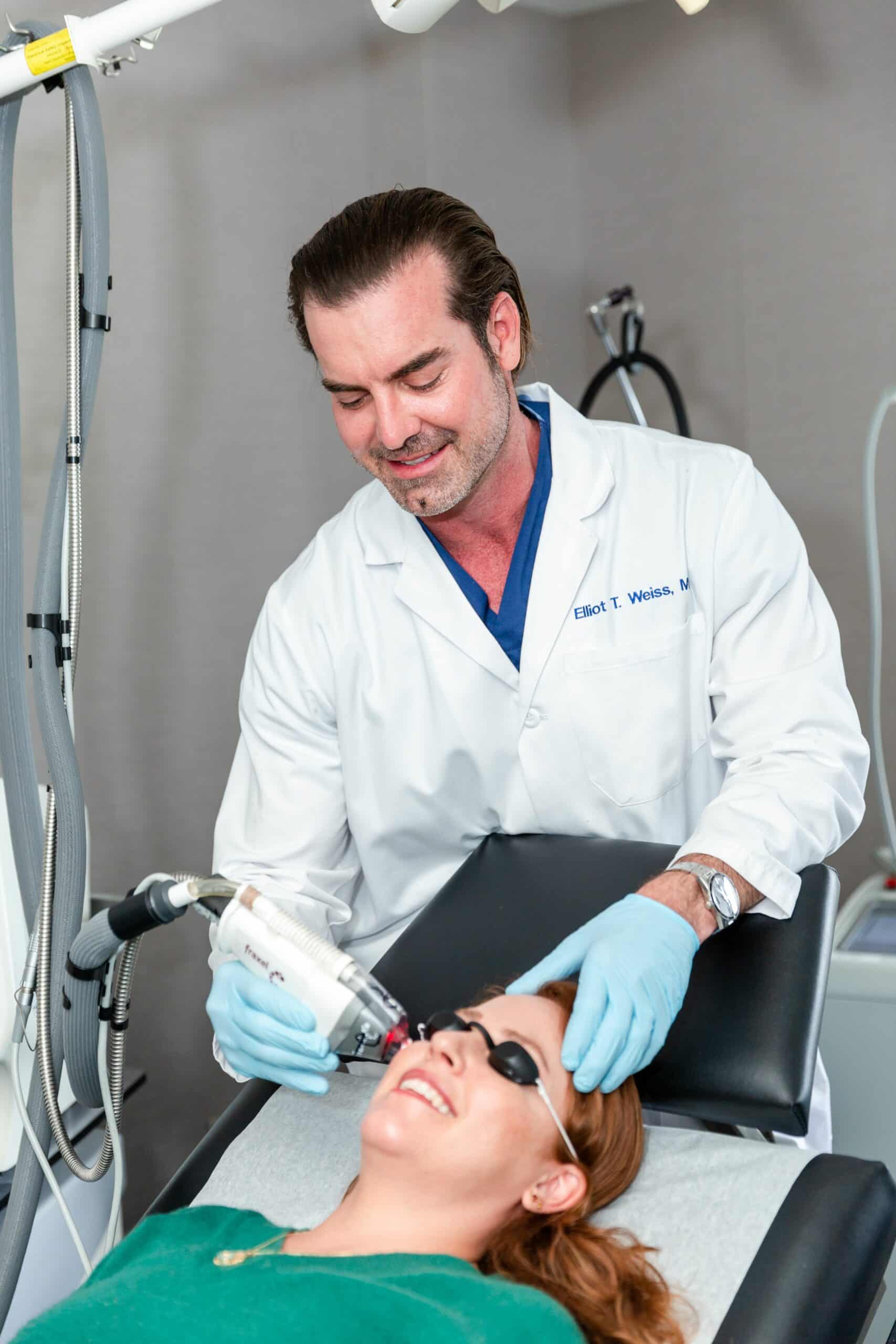 doctor performing laser under eye treatment