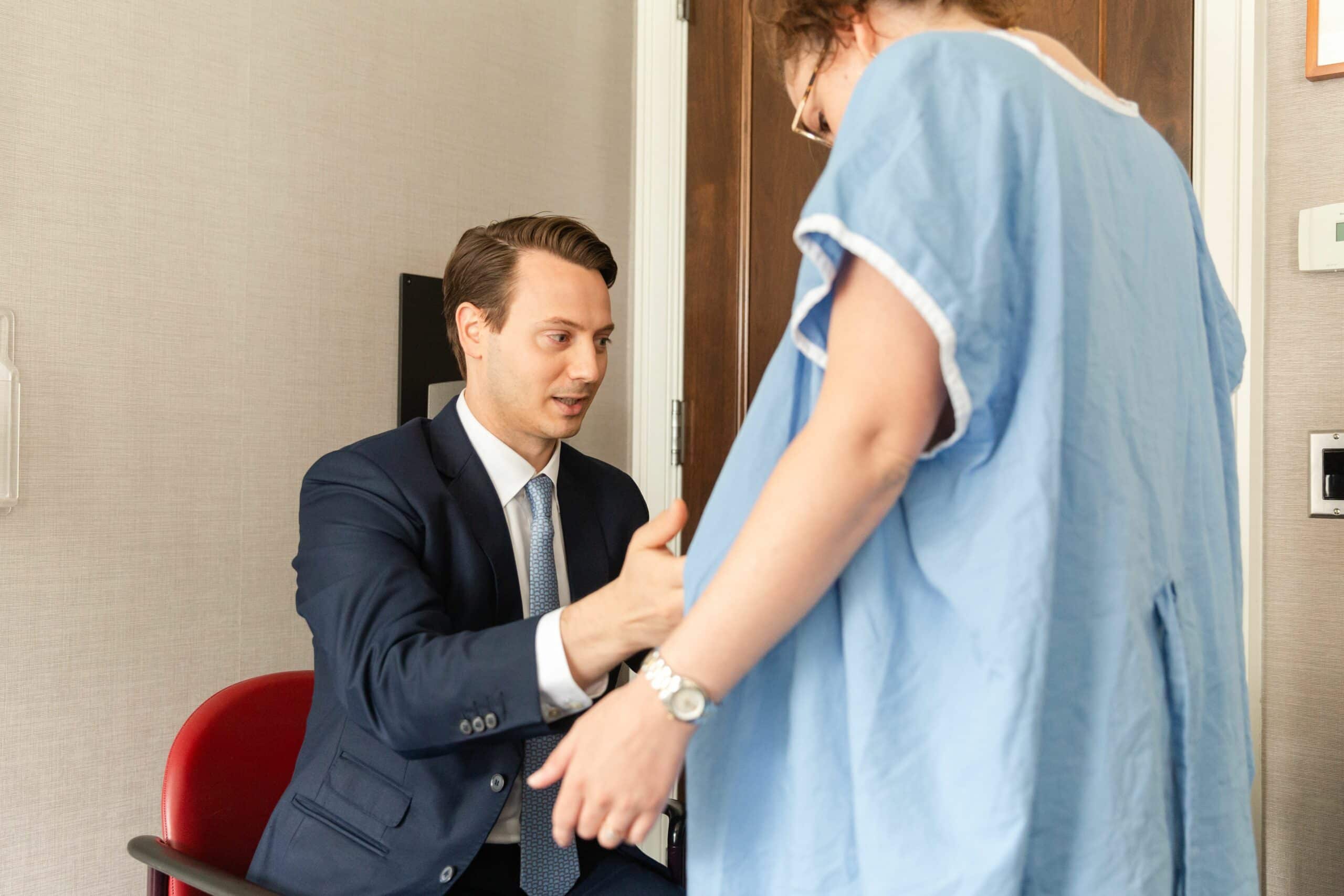 doctor performing laser stretch mark removal treatment