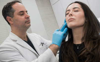 Image 34 doctor performing laser scar treatment in New York City