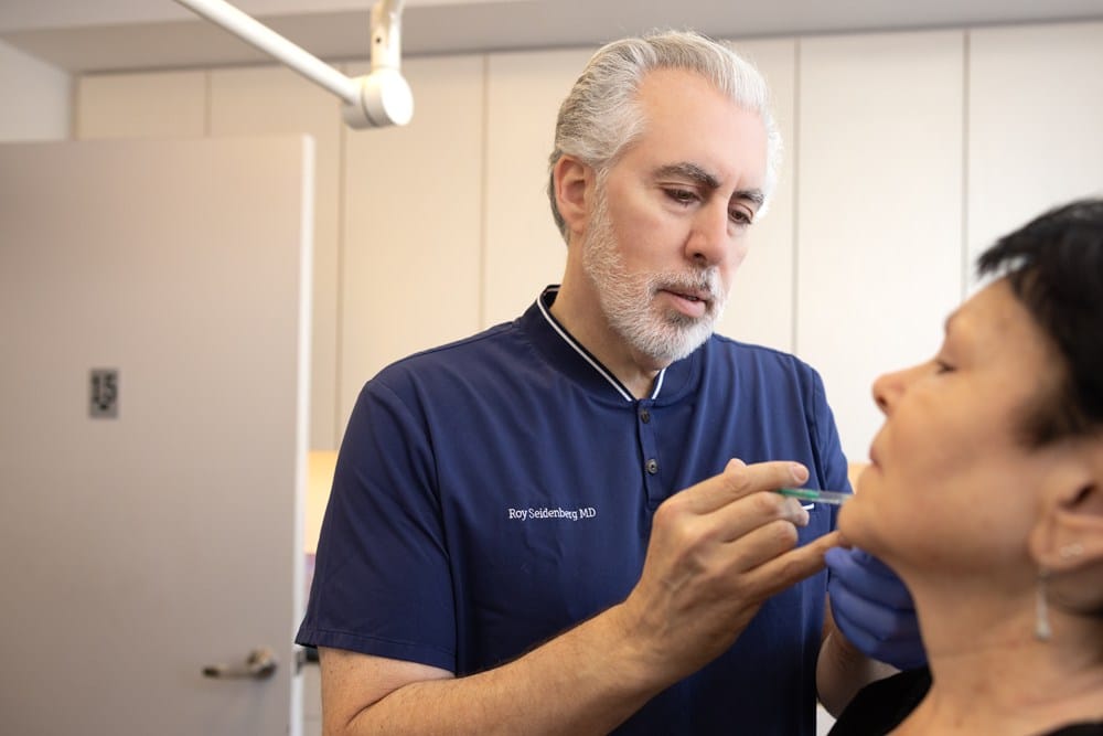 doctor performing restylane refyne and defyne injections in new york